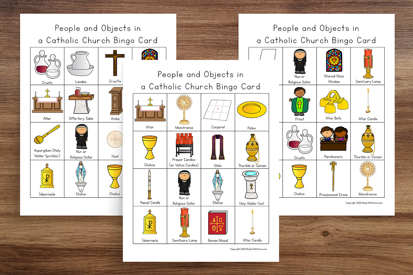 Three Objects and People in a Catholic Church Bingo Cards for Kids Three Objects and People in a Catholic Church Bingo Cards for Kids sitting on a wooden surface.